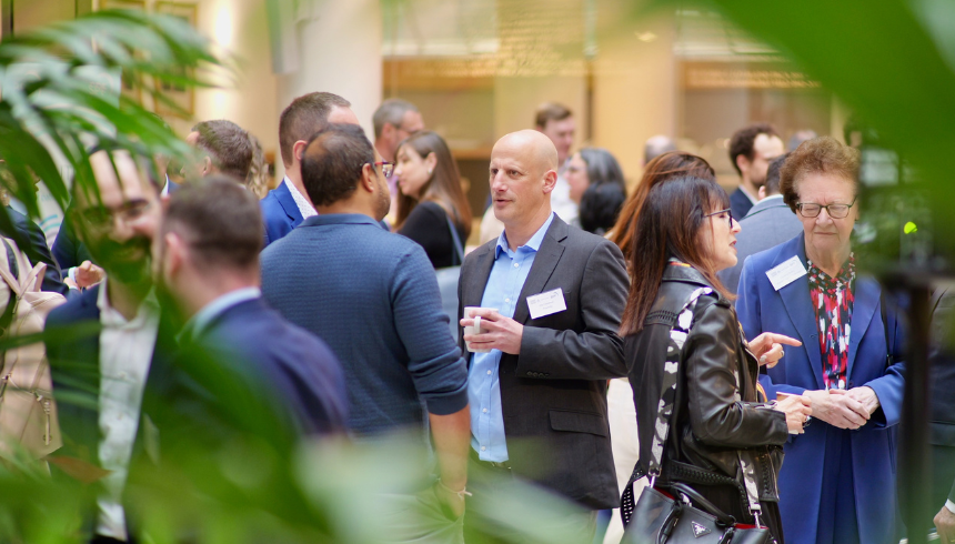 People networking during a conference